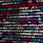 Binary digital HTML/CSS Javascript source code web design coder. Made with Canon 5d Mark III and vintage analog lens Leica APO Macro Elmarit-R 2.8 100mm.